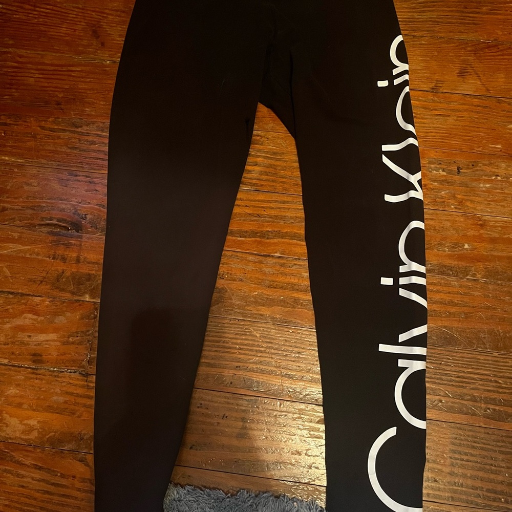 Calvin Klein Black Form-Fitting Pants with Full Length and Side Graphic